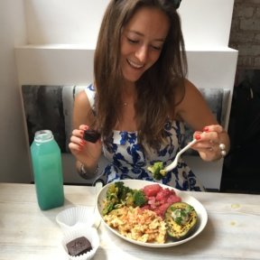 Jackie eating veggies and brownies at Mulberry & Vine